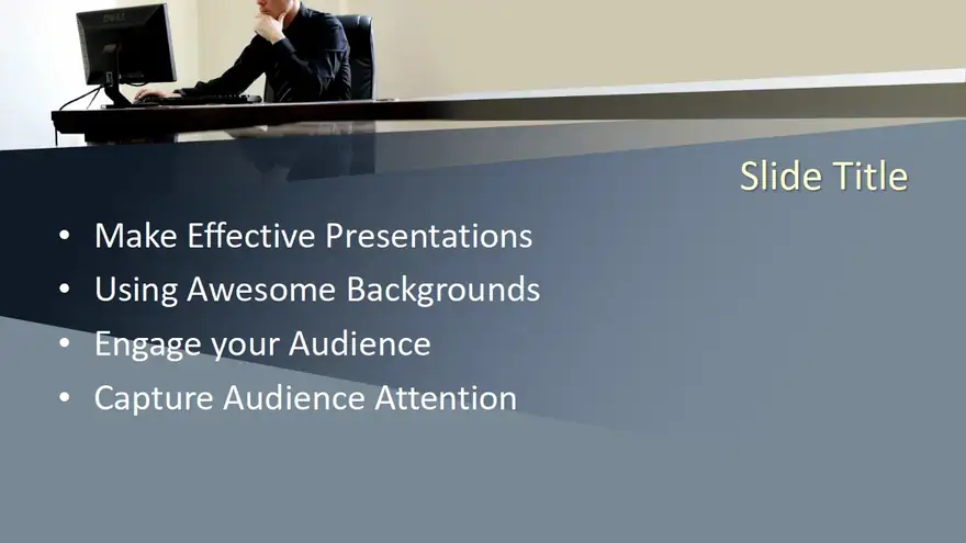 Free Man Working at Desk PowerPoint Template
