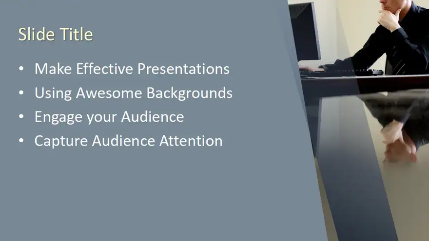 Free Man Working at Desk PowerPoint Template