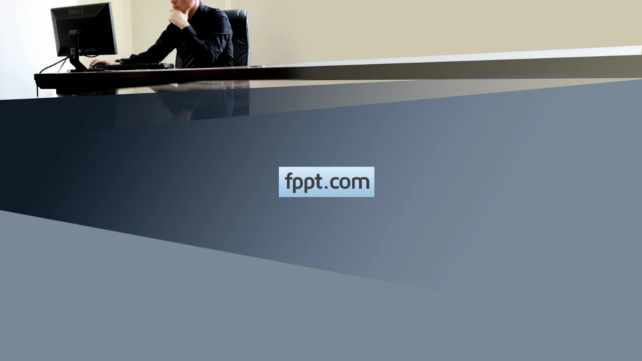 Free Man Working at Desk PowerPoint Template